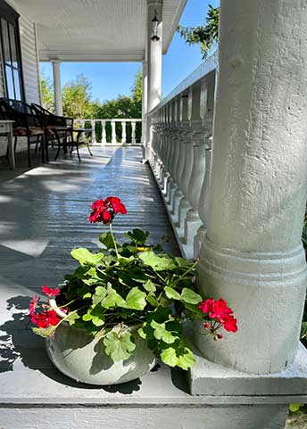 Welcoming Flowers on the Front Porch